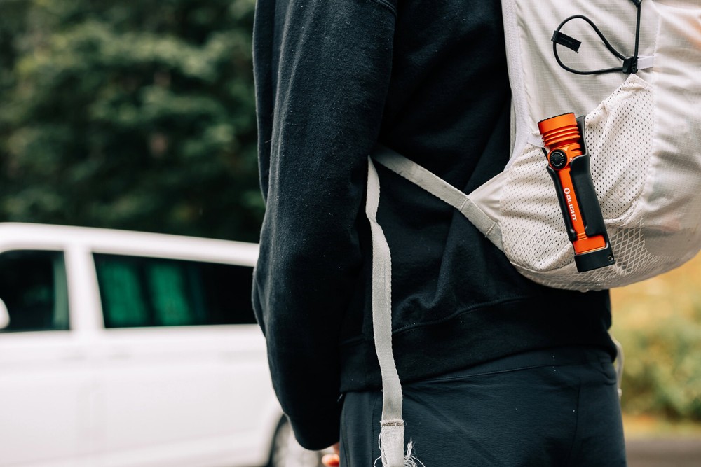 Olight Seeker 4 Pro Orange Flashlight, Versatile Holster, 4600L, Cool White