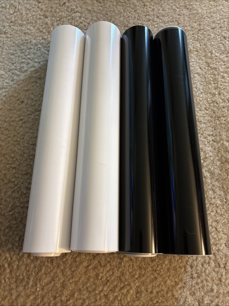 Cricut vinyl rolls- 2 White & 2 Black
