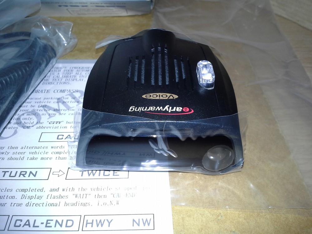 Early Warning RSX-555 Compass/Voice Radar /Laser Detector. open box