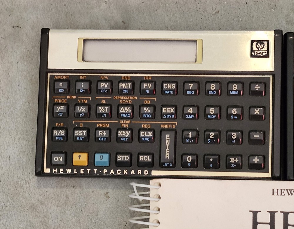 2 Hewlett Packard HP-12C Financial Calculator + Handbook