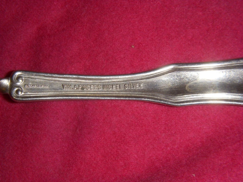 WM A ROGERS TWISTED HANDLE MASTER BUTTER KNIFE