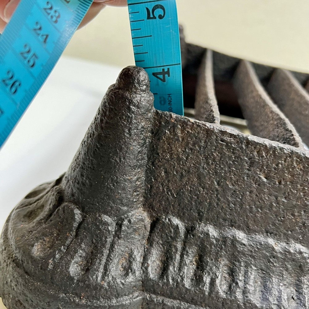 Vintage antique cast iron boot scraper