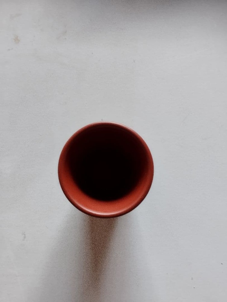 Reddish-brown ceramic sake bottle and 4-piece choko set