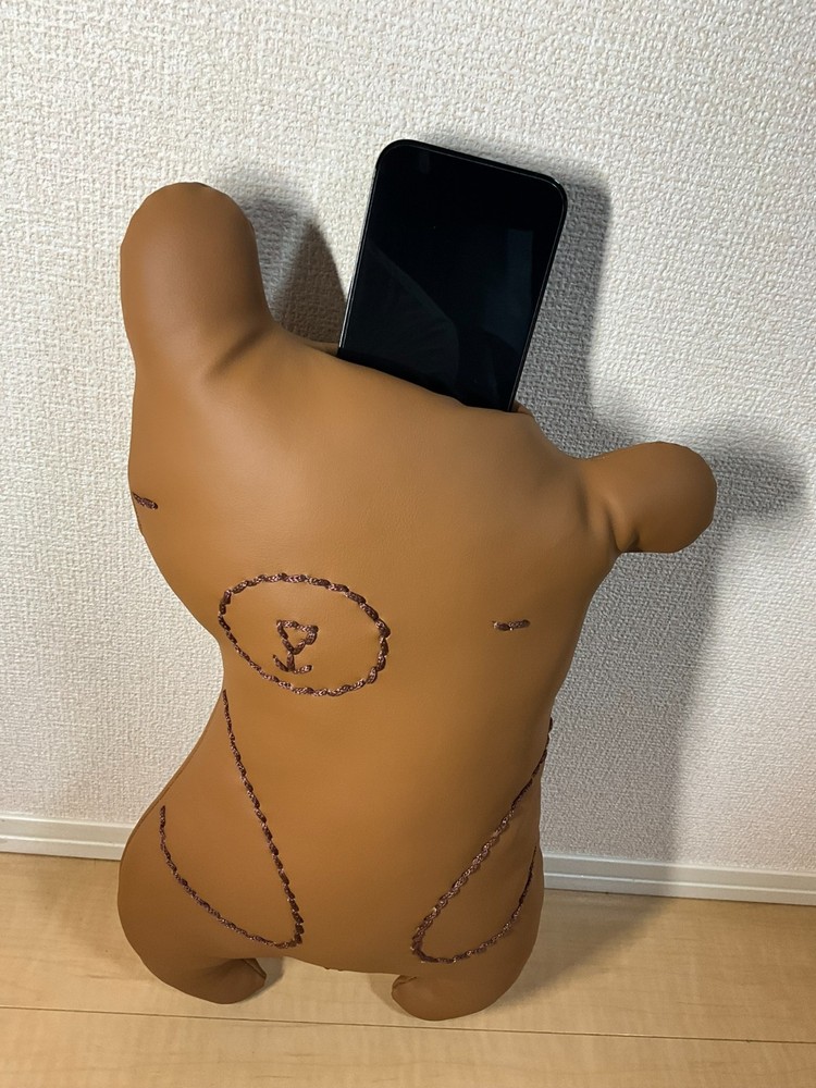 Handcrafted leather teddy bear that can chat in several languages
