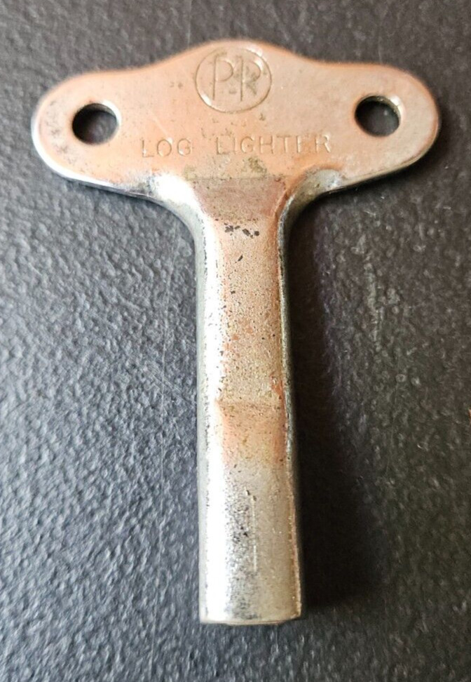 PP LOG LIGHTER. METAL KEY.