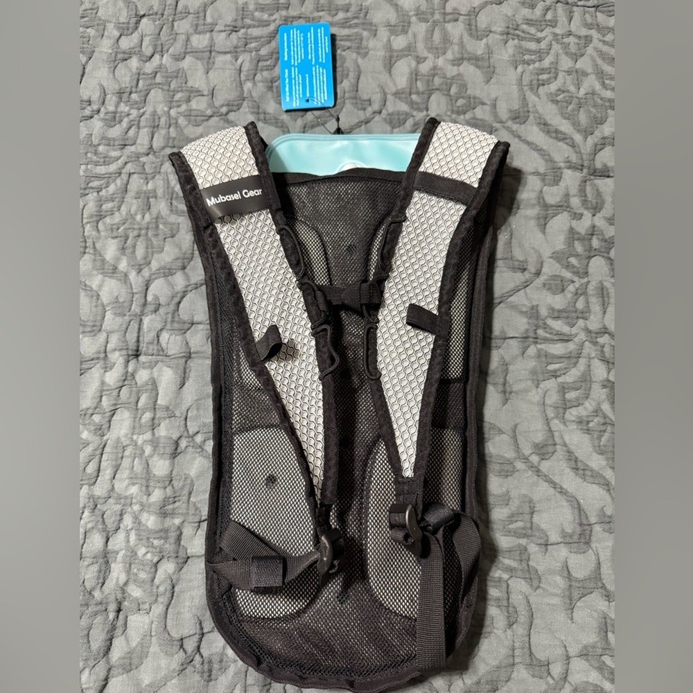 Mubasel Gear hydration backpack hiking storage compartments lightweight outside