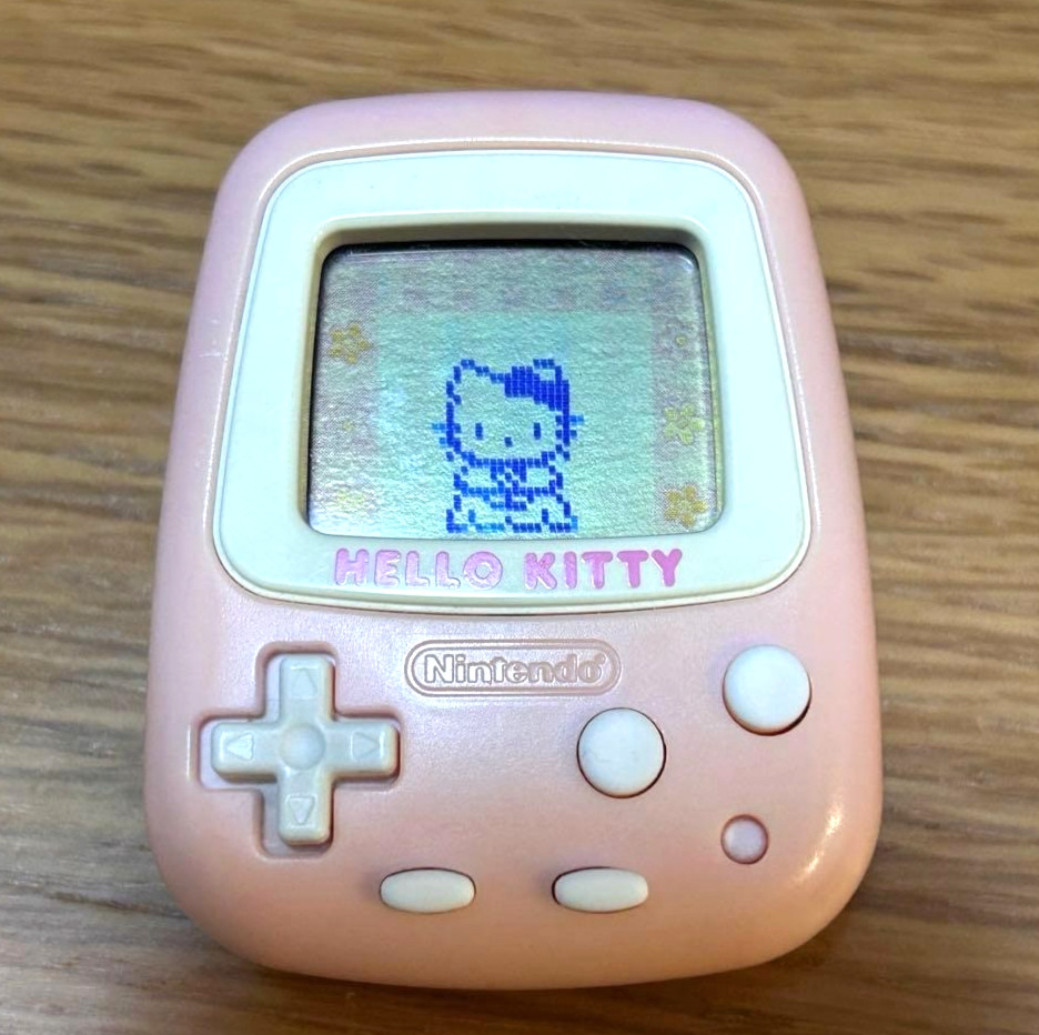 Used Hello Kitty Nintendo Pedometer Handheld Game Console Sanrio