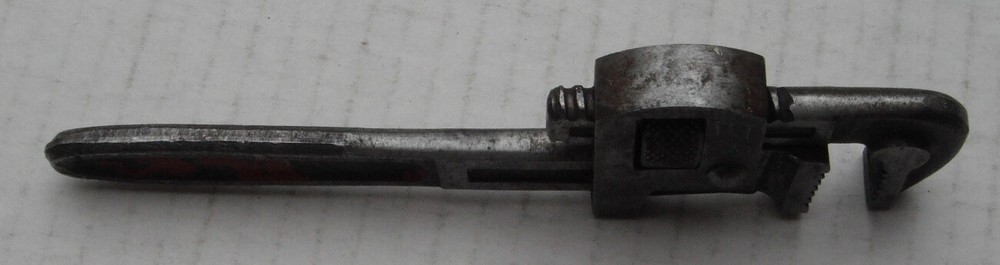 Small adjustable pipe wrench marked No 8...West Germany....old er