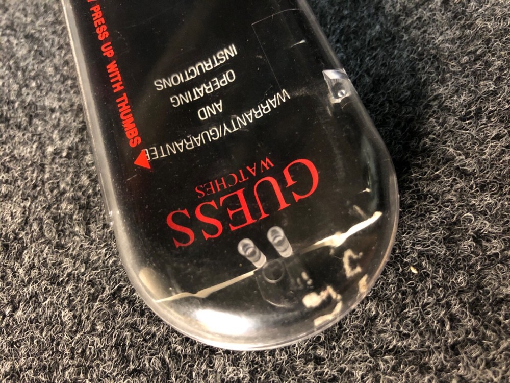 Empty Guess Container/ instruction booklet guess by Georges Marciano