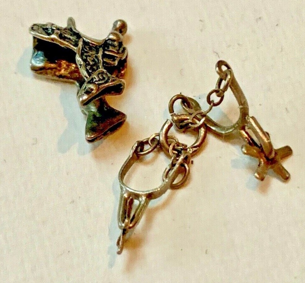 2  Unmarked Charms Cowboy Saddle and Spears