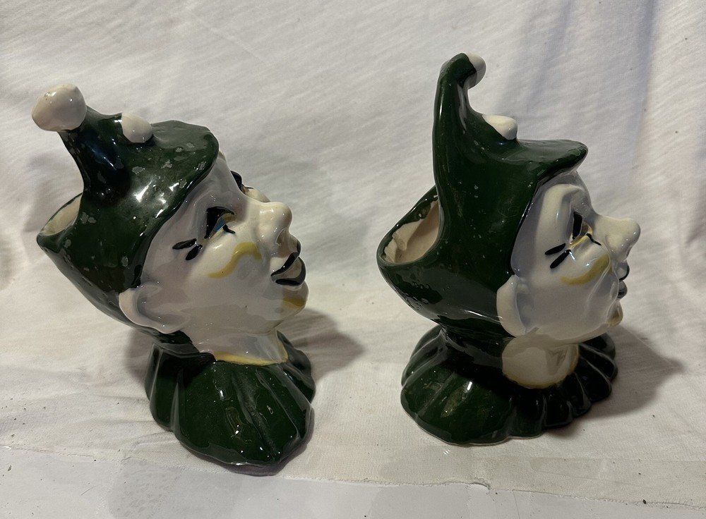 2 ceramic Jester planters.