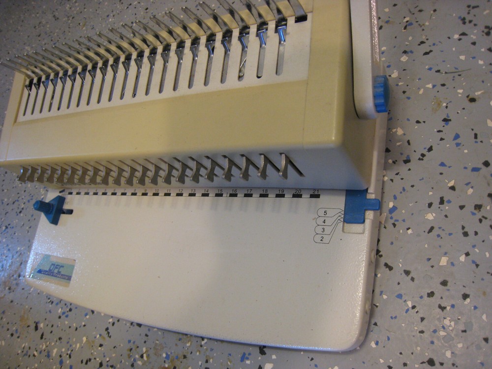 OFC Office binding comb machine Used 8 Times. Punches and Binds.