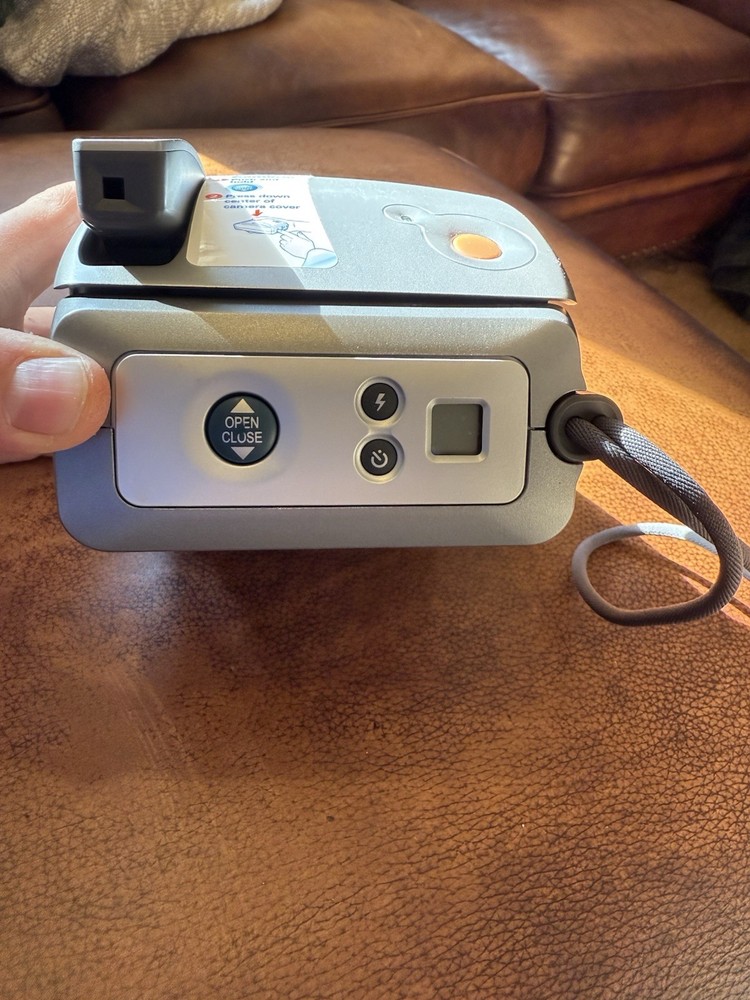 Polaroid One Instant Flash Film Camera Silver untested