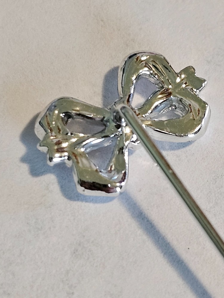 Silver-toned Lapel Pin with a Ribbon Bow