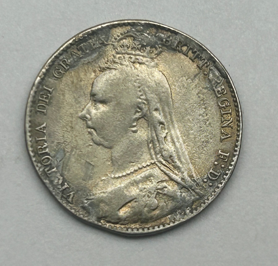 GREAT BRITAIN SIX PENCE 1`887 ENAMELED BACK