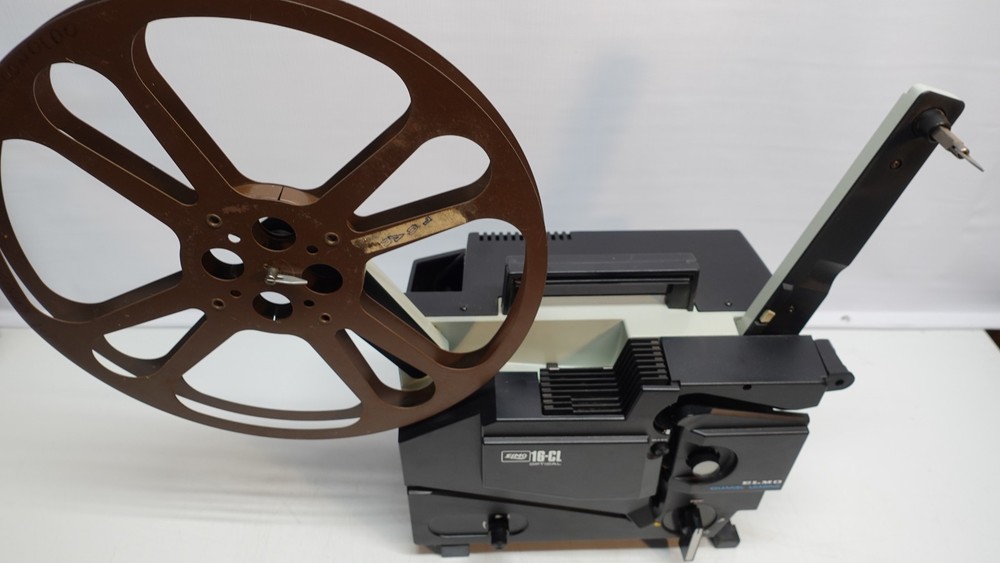 Vintage ELMO 16mm film projector 16-CL Partially working needs rollers