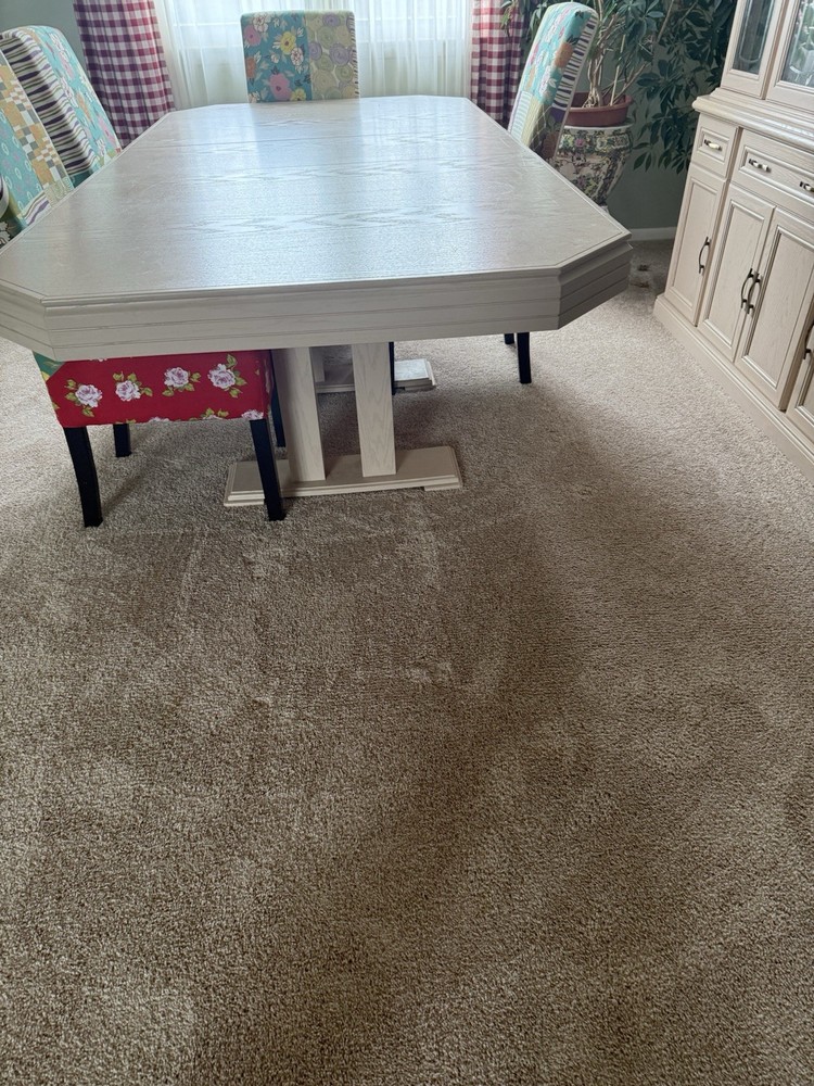 dining room set 6 chairs and lighted hutch ,table has leaf stored inside