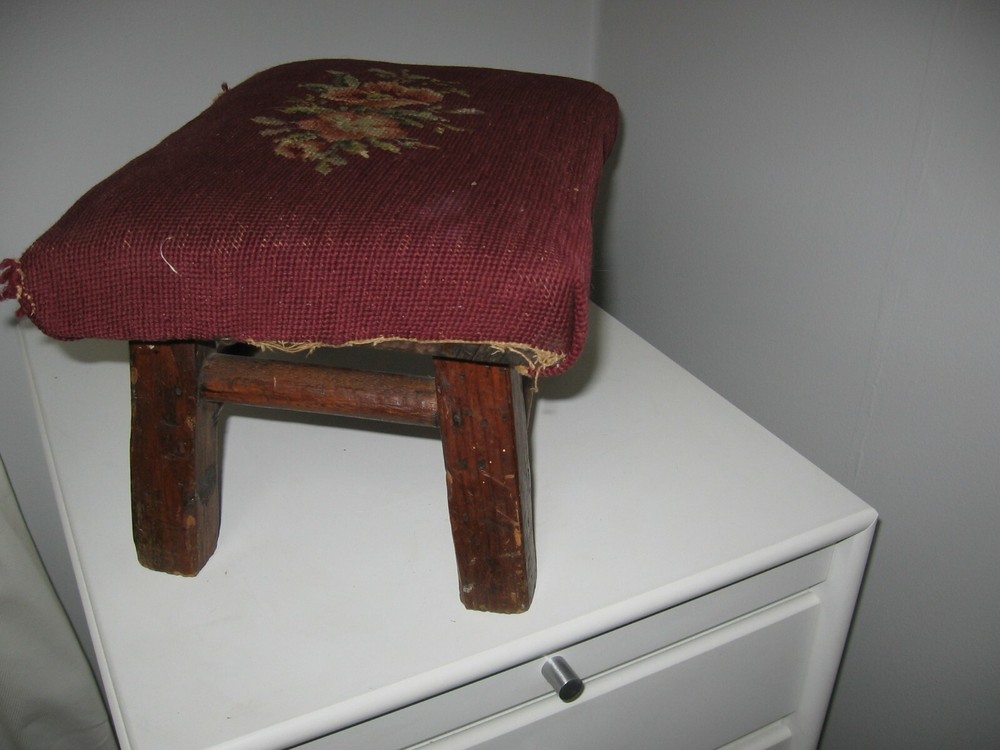 antique wood 4 legged foot stool with needlework top