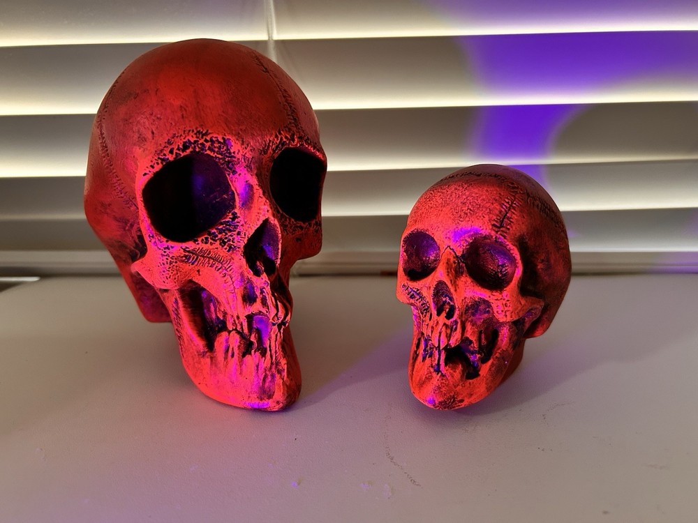 2 EA. RANDOTTI ORIGINAL LARGE & MEDIUM FLUORESCENT RED SKULLS STILL GLOW