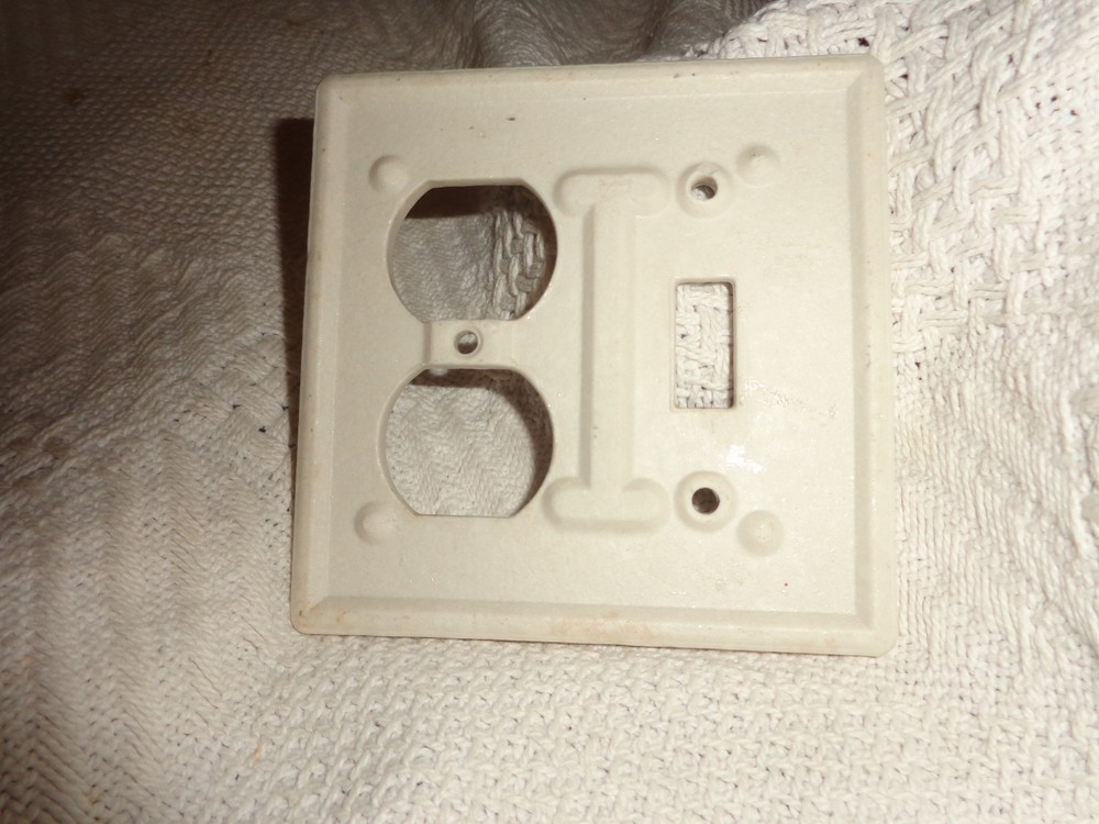 vintage ceramic electrical cover plate. switch and receptical.