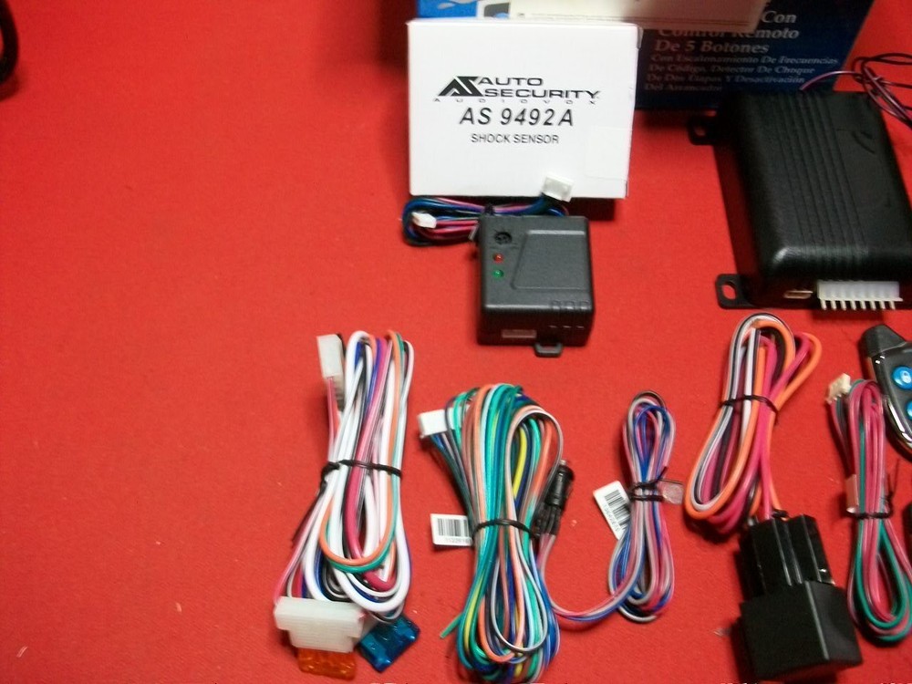 PRESTIGE SECURITY SYSTEMS # APS510C 5 BUTTON CODE HOPPING REMOTE SECURITY SYSTEM