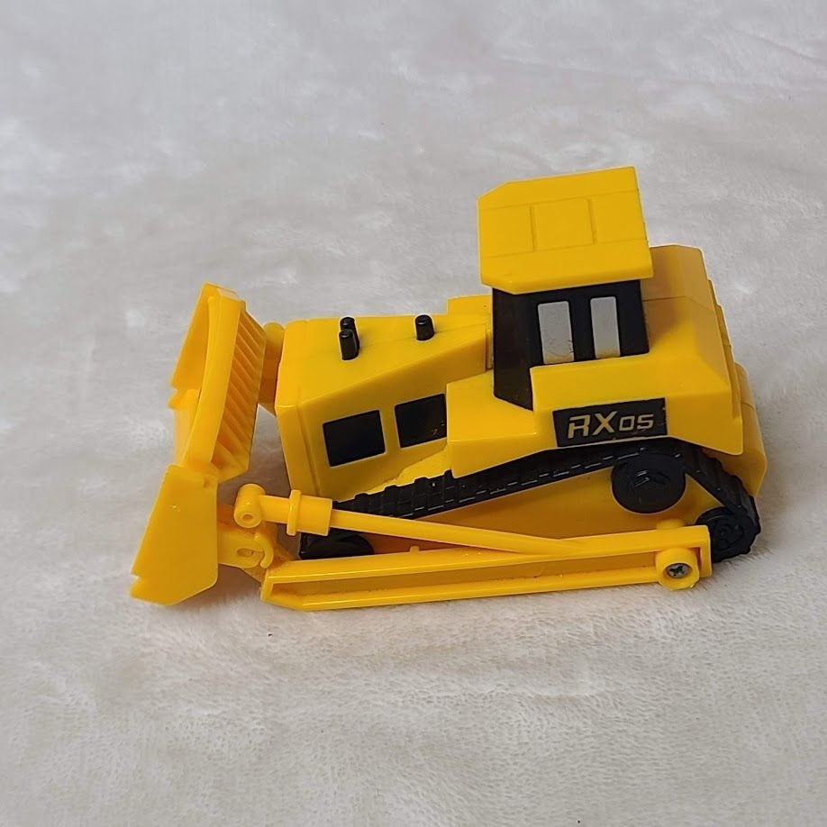 Yellow Plastic Toy Bulldozer With Movable Front Blade