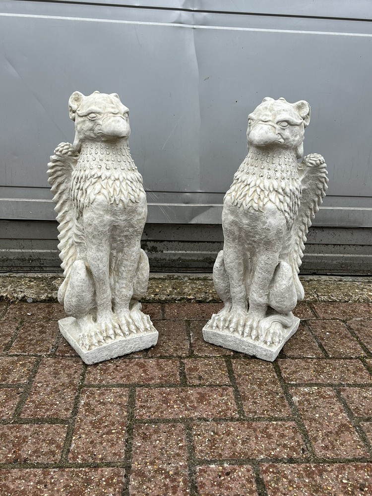 Pair Of Griffins On Architectural Columns