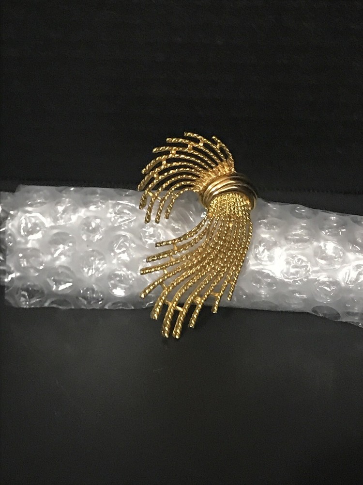 m jent brooch Sign