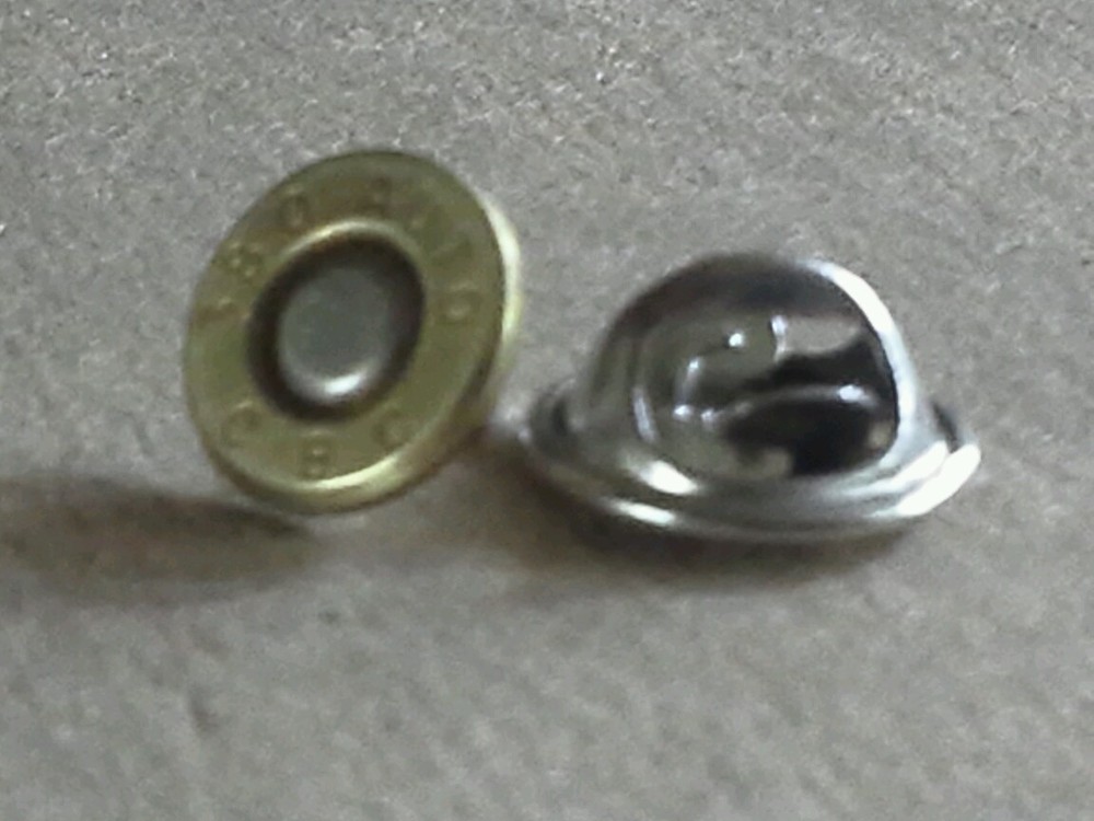 .380 Auto Bullet Lapel Pin. Unique un-dented primer! Most caliber available