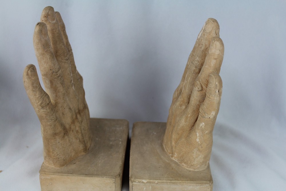 Plaster bookends Reading Hands