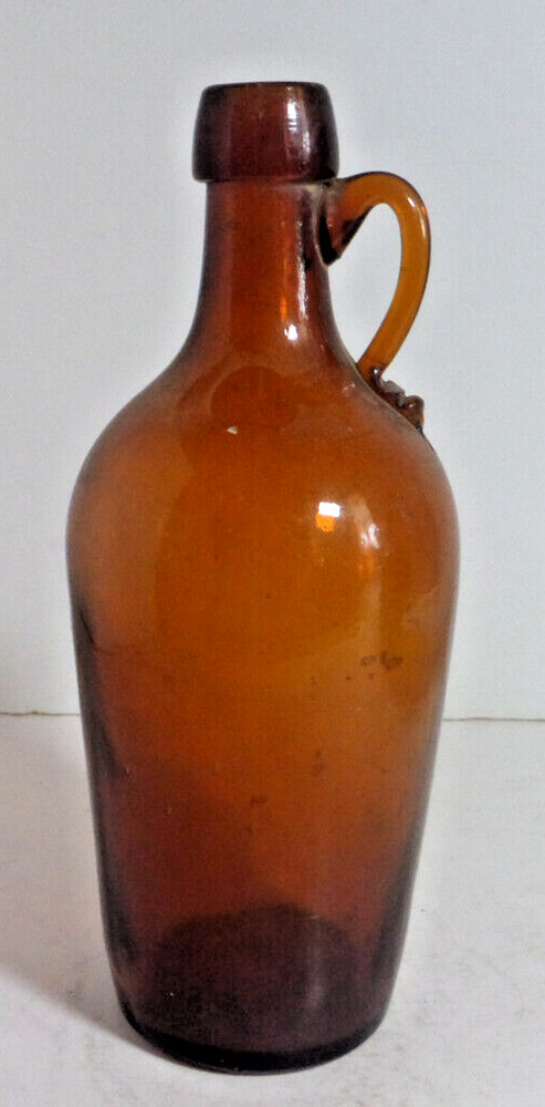 brown glass bottle applied handle antique EMPTY