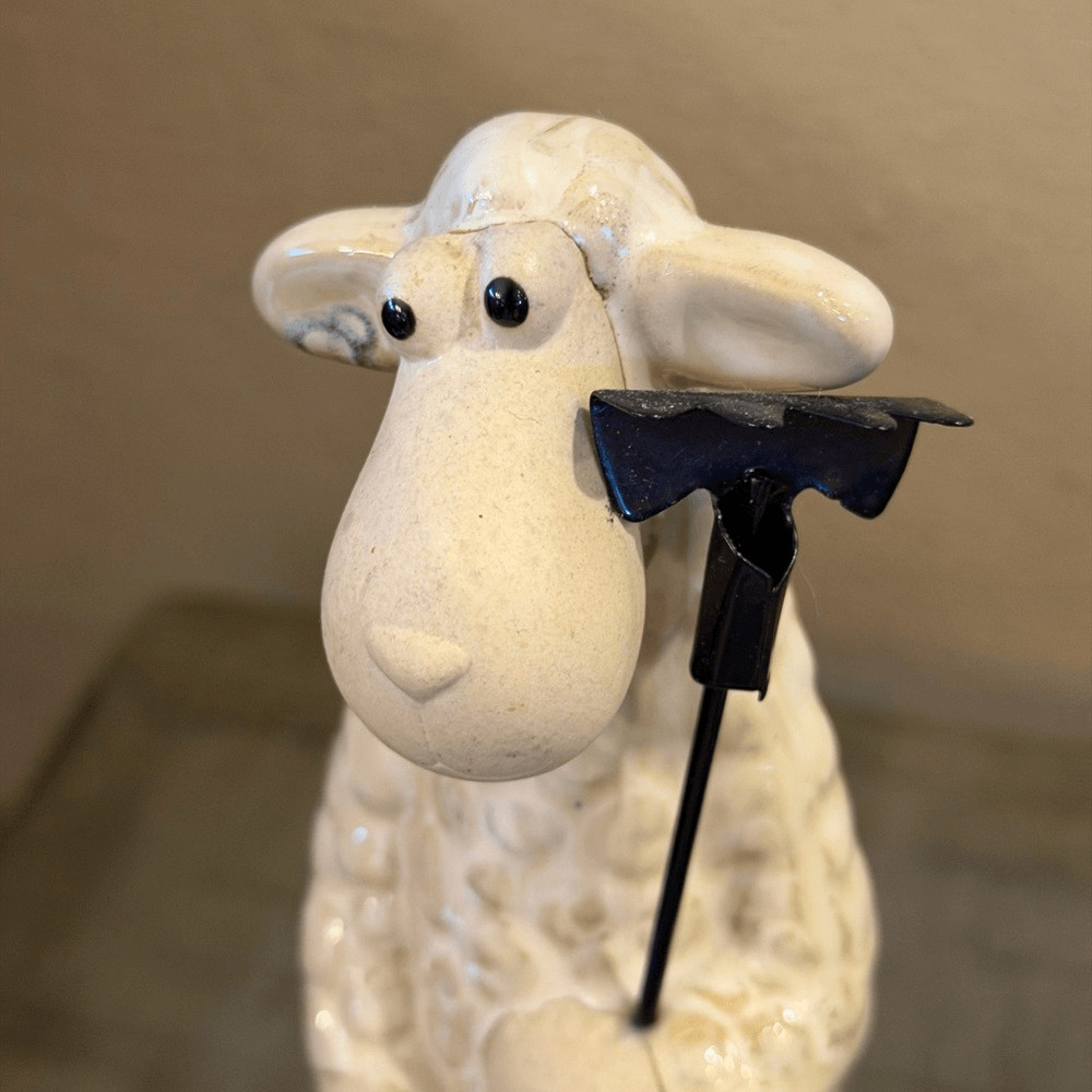 Ceramic Sheep Figurine with Black Staff
