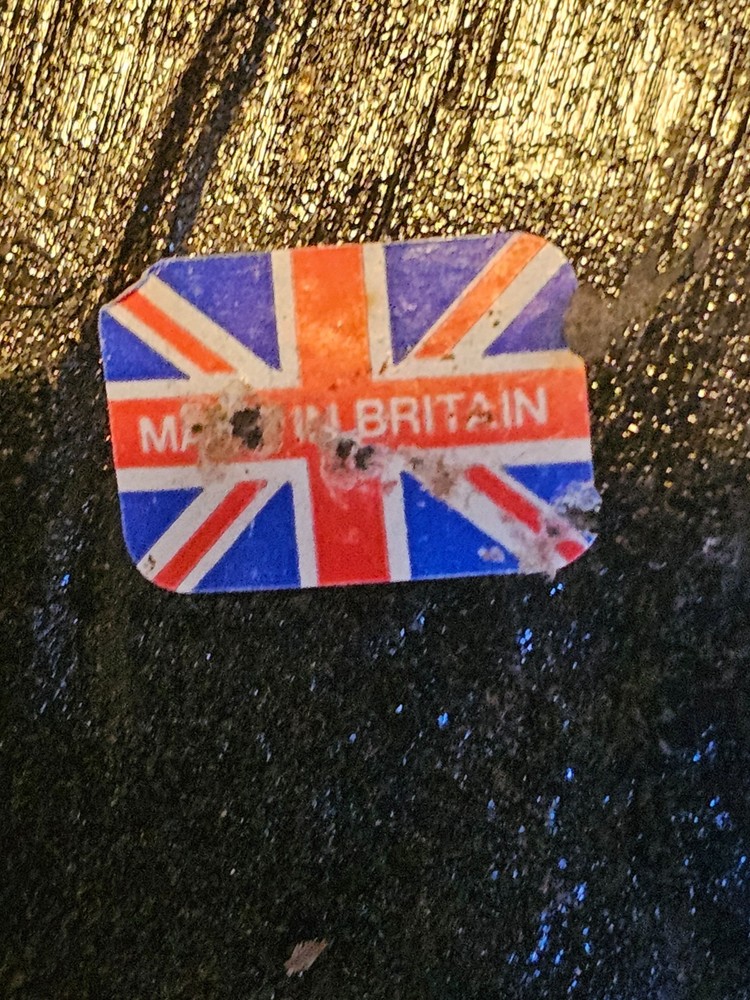 Axe Head has marked in Britain sticker on it