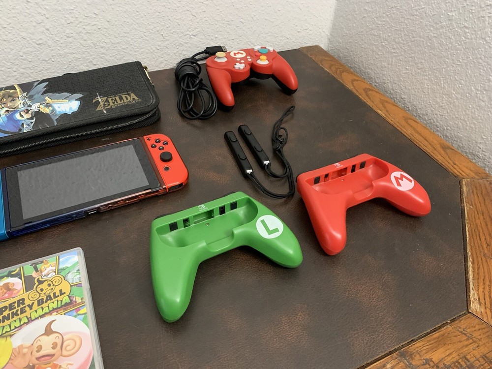 Nintendo Switch Console With A Bunch Of Stuff