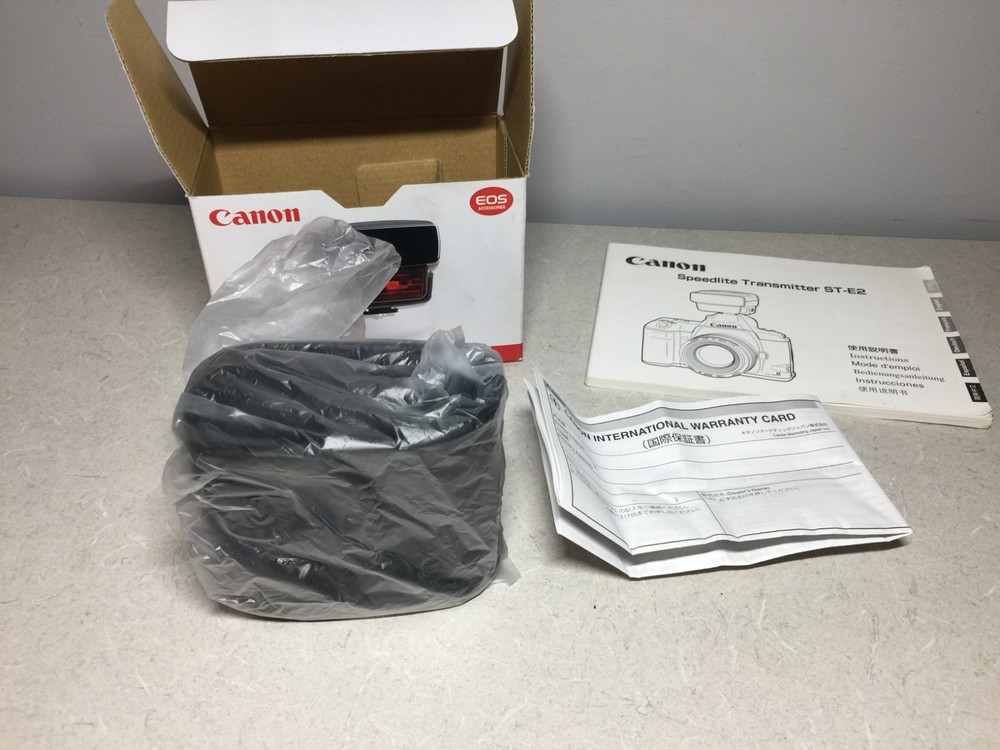 Canon Speedlite Transmitter ST-E2 manual EOS accessory shoe mount flash trigger