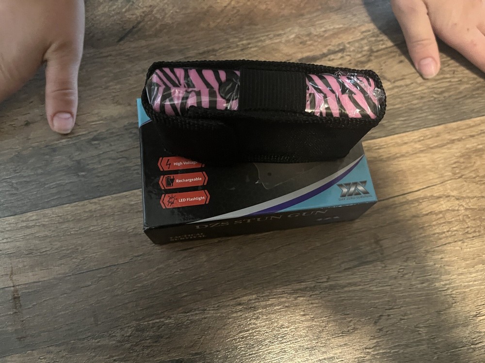 Powerful Stun Gun With LED flashlight, rechargeable Battery, (READ BELOW )