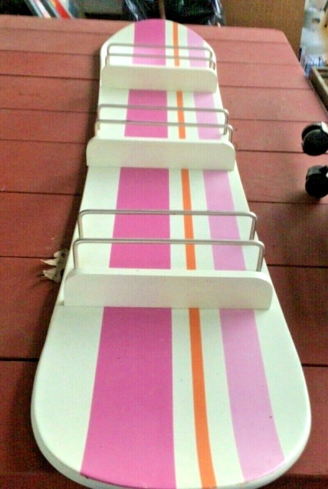 COMIC BOOK OR MAGAZINE RACK SNOWBOARD DESIGN