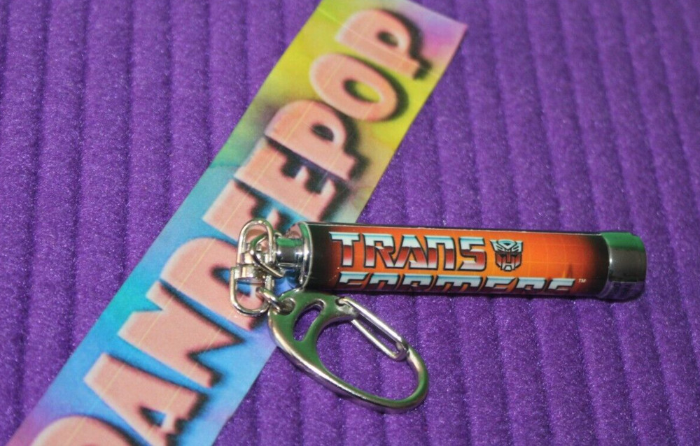 Hasbro Basic Fun Transformers Character Logo  Projection  Light Keychain 2006