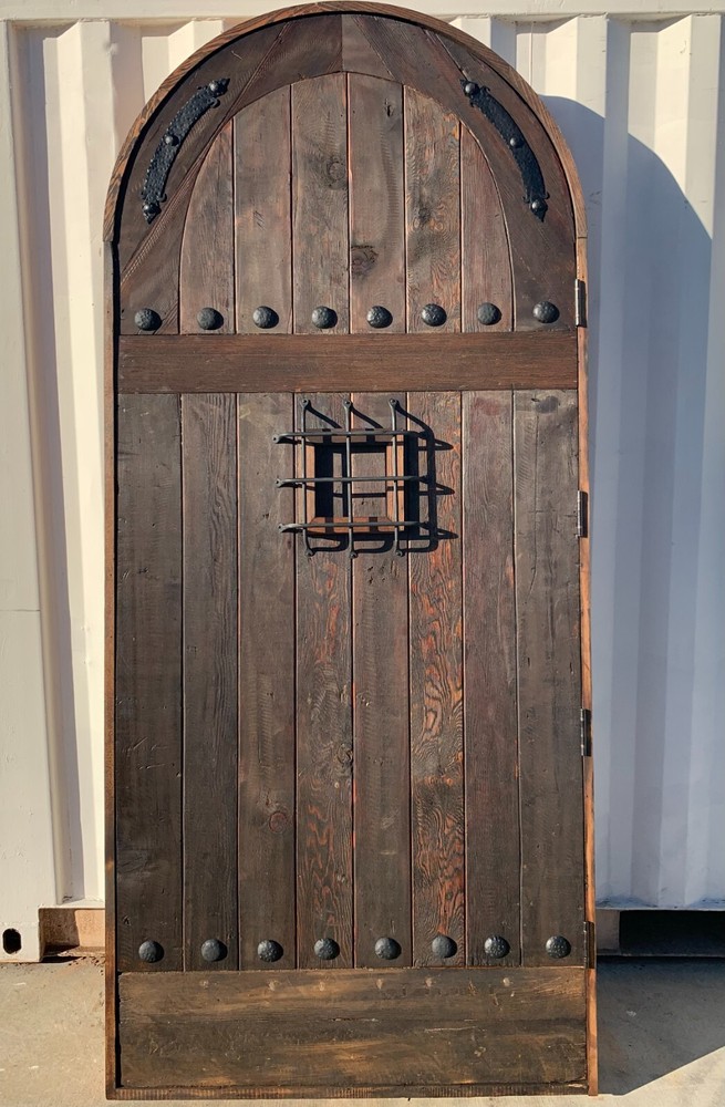 Rustic reclaimed solid old growth lumber Doug Fir wine room solid speakeasy cage
