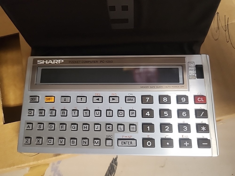 Sharp PC-1250A Pocket Computer W Case Hand Book Original Box Not Working