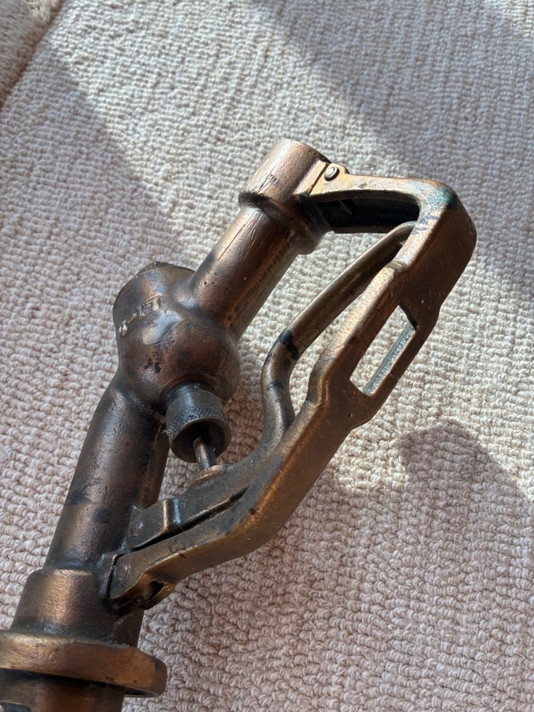 vintage gas pump nozzle brass