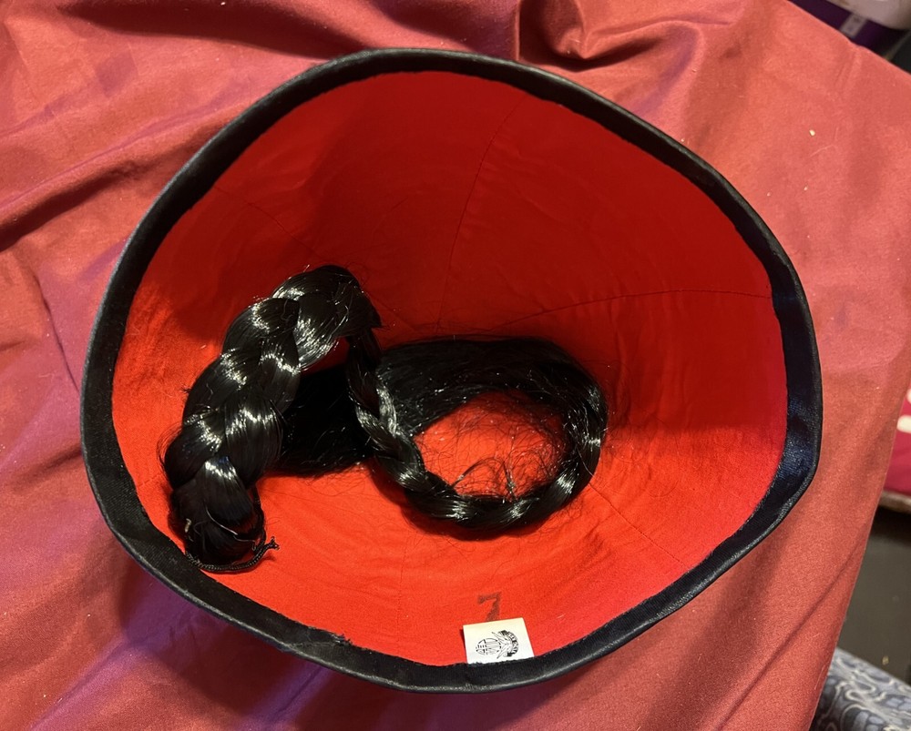 Oriental costume hat with long black braid