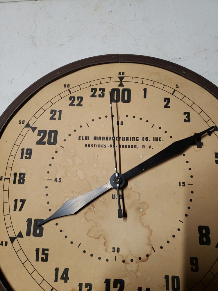 Vintage Elm Manufacturing Co Clock,