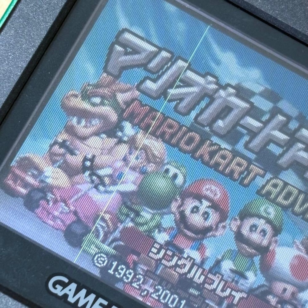 Game Boy Advance SP Green + 4 Games