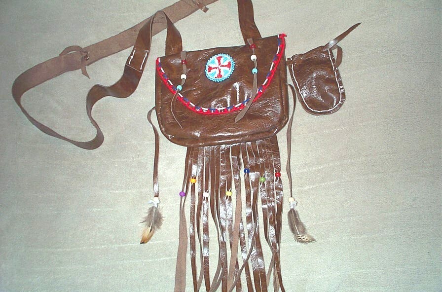 BLACK POWDER, BEAVER TAIL, LEATHER POSSIBLE BAG