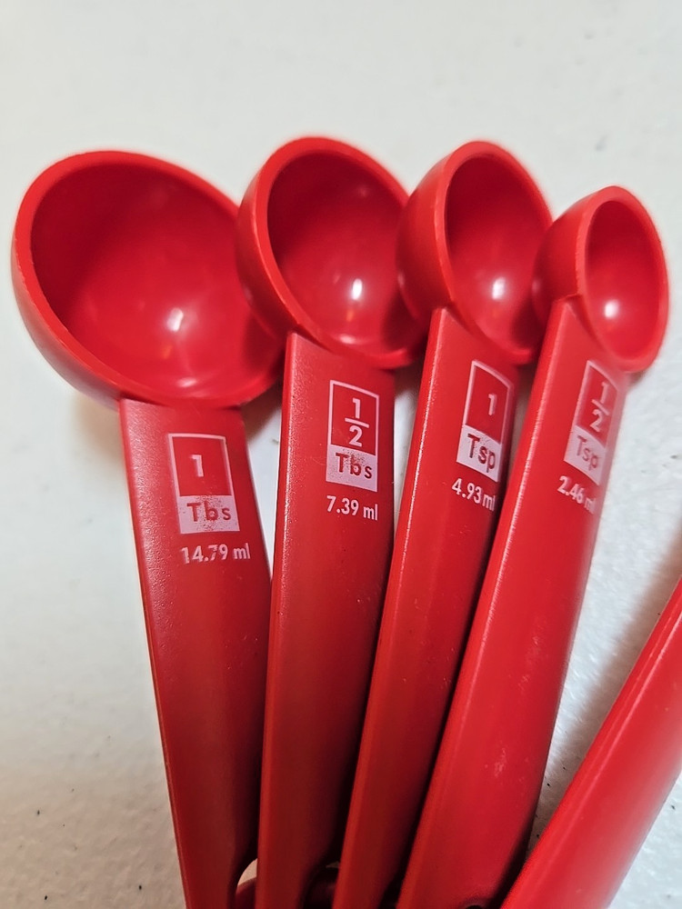 Five Piece Red Plastic Measuring Spoon Set; Round