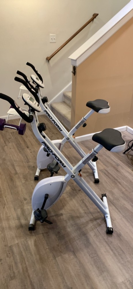 pro-form  white foldable stationary exercise peddling bike