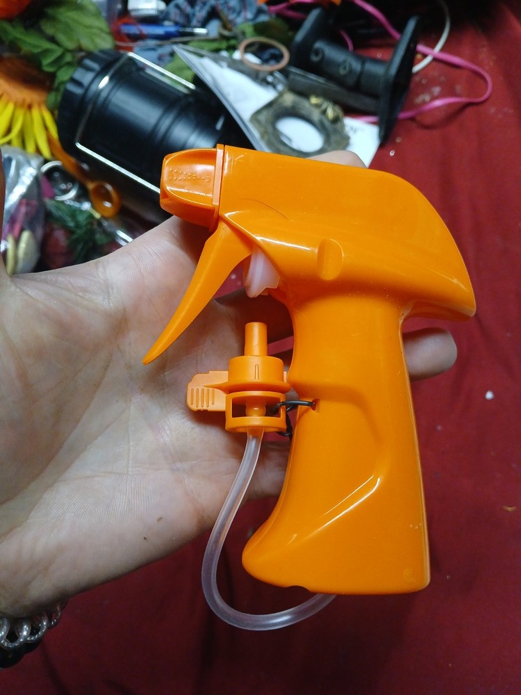 yellow plastic spray trigger handle