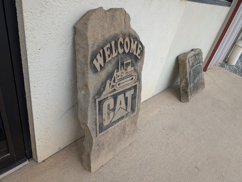 Concrete Caterpillar Welcome Sign