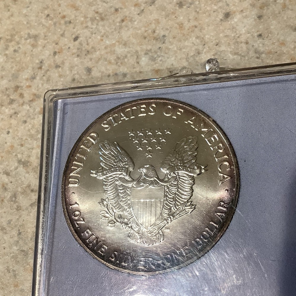 1990 American Silver Eagle "Rainbow Toning”
